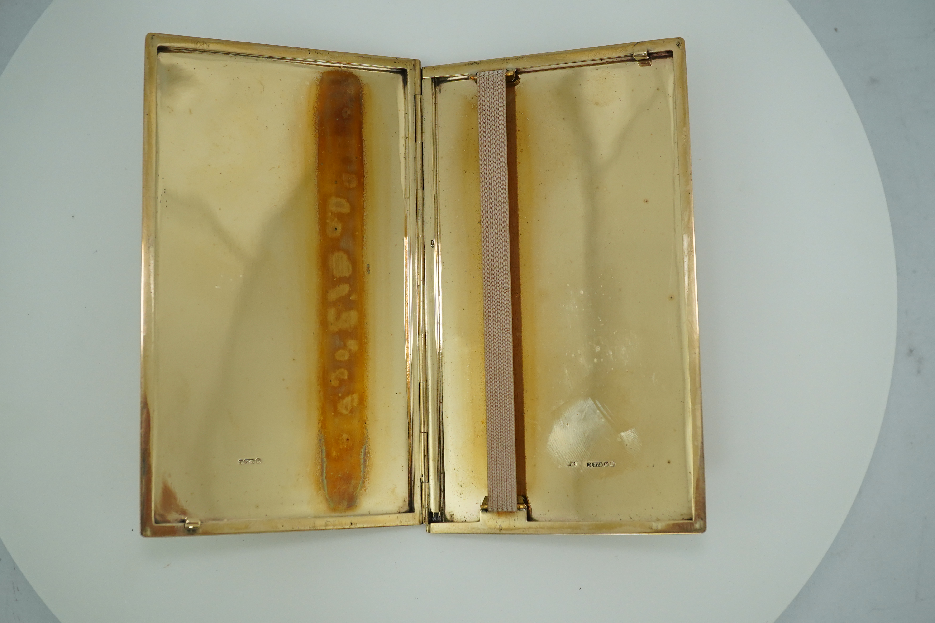 A 9ct gold cigarette case, circa 1950